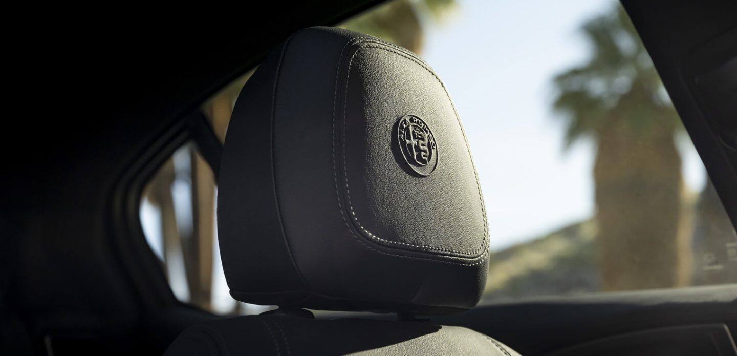 Display A close-up of the driver's headrest in the 2023 Alfa Romeo Giulia.