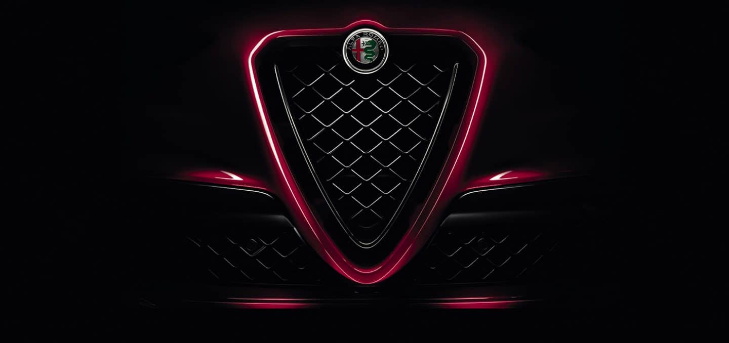 Display The V Scudetto grille on the front of the 2024 Alfa Romeo Giulia Quadrifoglio.