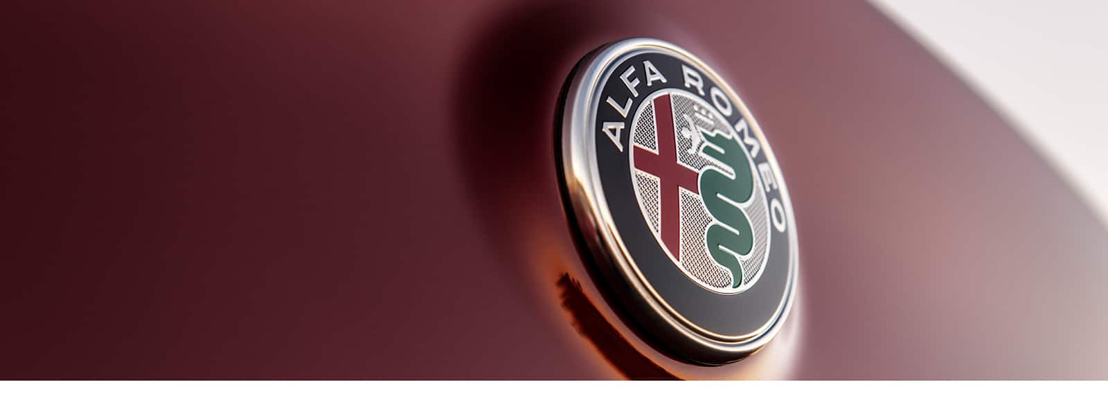 A close-up of the Alfa Romeo badge.